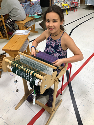 Student weaving